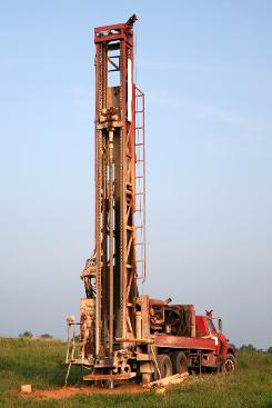 water-well-drilling-spokane-orange-truck-borehole-for-soil-testing